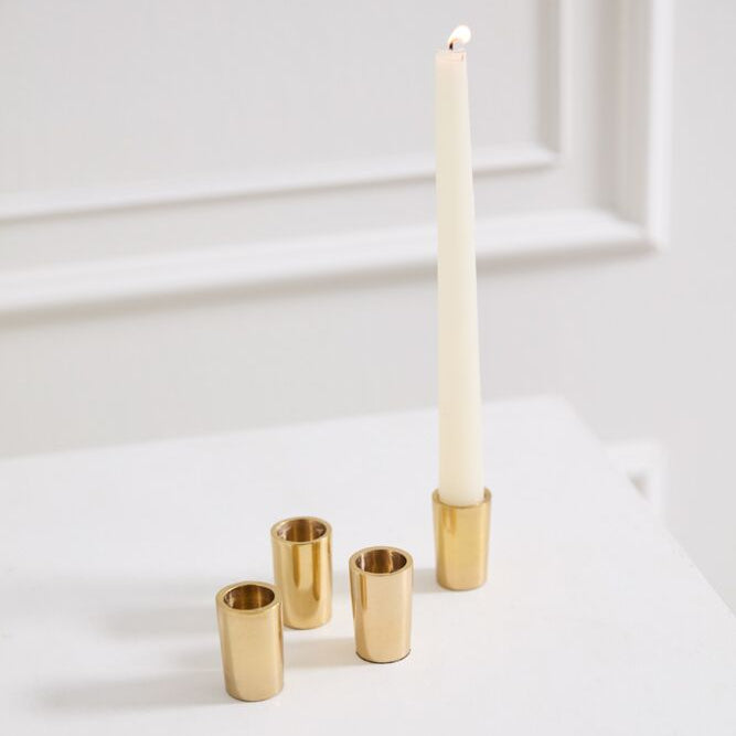 Tune Candleholder Set of 4 shown as a styled home décor accent