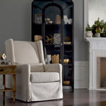 Four Hands Swivel Wing Chair
